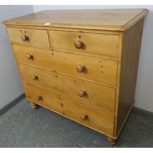 846 - A Victorian stripped pine chest of two short over three long graduated drawers with turned wooden kn... 