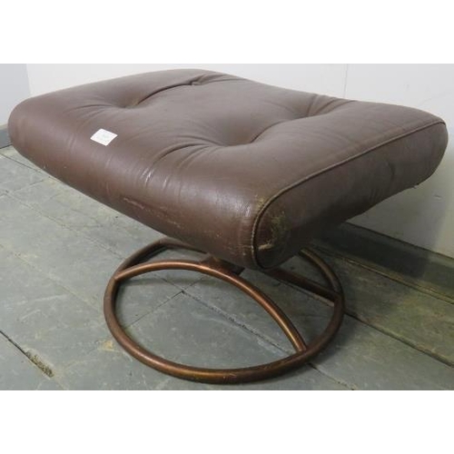 848 - A vintage mid-century footstool by Ekornes, upholstered in distressed buttoned brown leather, on a b... 