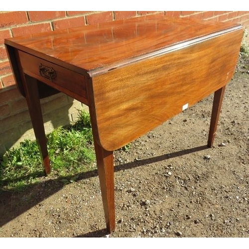 864 - A Georgian mahogany Pembroke table, with single drawer and dummy drawer, on tapering square supports... 