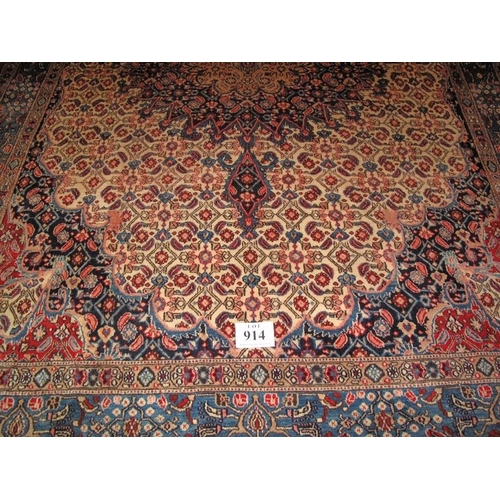 914 - North East Persian meshed Belouch rug, central pattern on a cream ground. In very good condition. 31... 