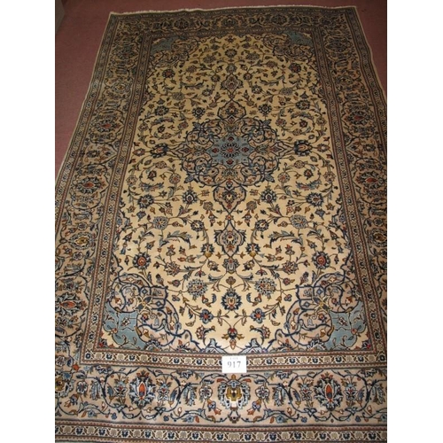 917 - A fine Persian Kashan carpet, central pattern on cream field with foliage. Good clean condition. 305... 