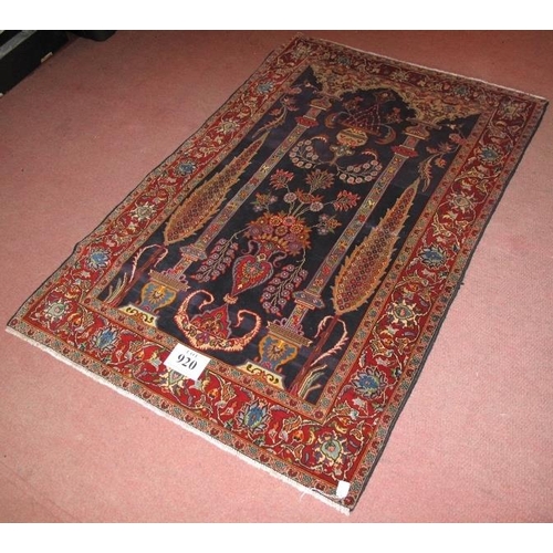 920 - Persian Qom rug, central scene of columns and vase with flowers. 157cm x 105cm.