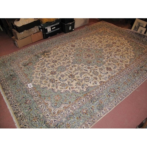 928 - A good Persian Kashan carpet pale blue on cream. In very good condition. 368cm x 244cm.