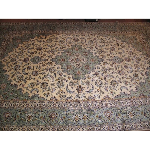 928 - A good Persian Kashan carpet pale blue on cream. In very good condition. 368cm x 244cm.