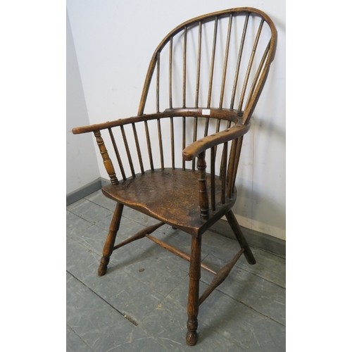 705 - A good 18th century elm Windsor hoop back chair, on turned canted supports with an ‘H’ stretcher. c1... 