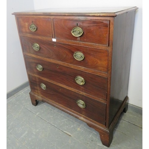 883 - A George III mahogany straight-front chest of two short over three long graduated cock-beaded drawer... 