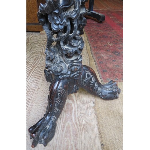 707 - A 19th century Chinese rosewood circular occasional table, with inset red marble top above a foliate... 