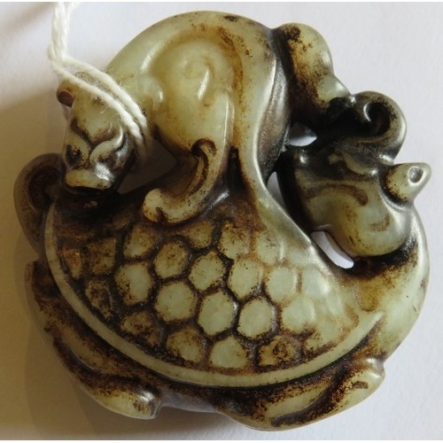 217 - A Chinese carved pale celadon and black Jade model depicting a bat on a turtle, Ming style but likel... 