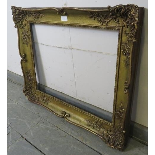 832 - An ornate 19th century gilt gesso mirror frame depicting foliate motifs. H60 W72 D7 (approx).
Condit... 