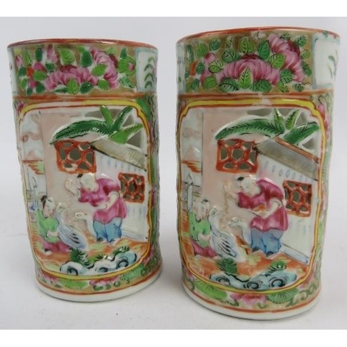 107 - A pair of 19th century Chinese Canton famille rose porcelain vases, cylindrical form with pierced an... 