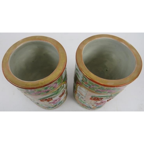 107 - A pair of 19th century Chinese Canton famille rose porcelain vases, cylindrical form with pierced an... 