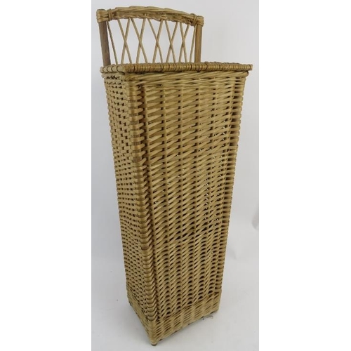 109 - A vintage French wickerwork 'french-stick' bread storage basket. Overall height 73cm. Condition repo... 