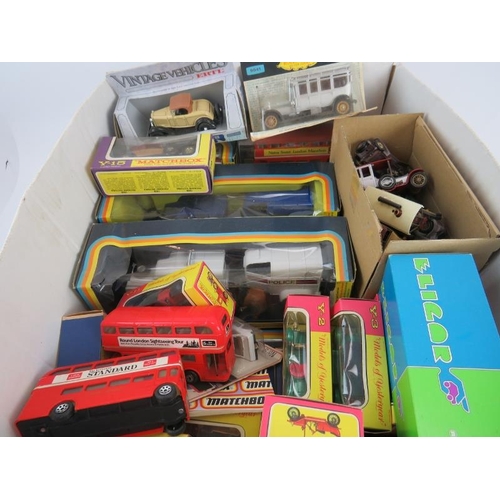 129 - A large collection of model cars, mostly boxed, including Matchbox, Corgi, Ertl and some unbranded.
... 