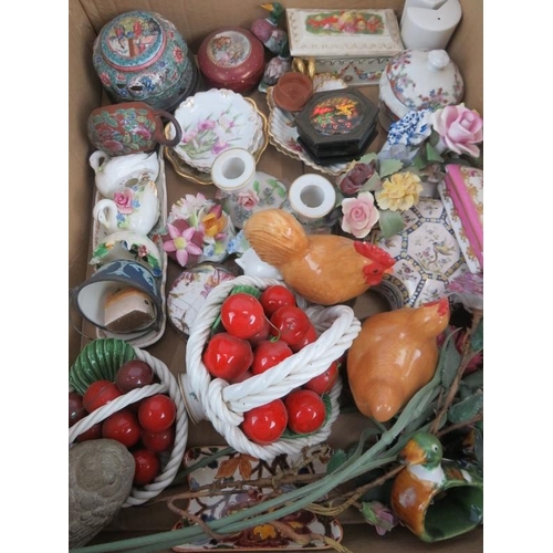 134 - A collection of small mainly porcelain boxes, dishes and ornaments including two Italian cherry bask... 