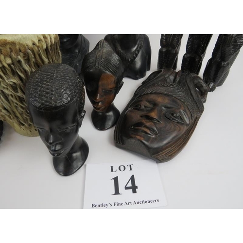 14 - Collection of African carved figures and heads. Assorted hard woods and zebra skin drum, 16cm height... 