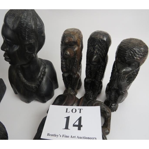 14 - Collection of African carved figures and heads. Assorted hard woods and zebra skin drum, 16cm height... 