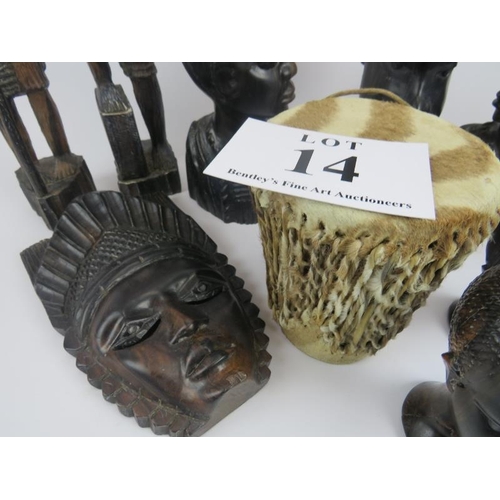 14 - Collection of African carved figures and heads. Assorted hard woods and zebra skin drum, 16cm height... 