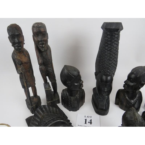 14 - Collection of African carved figures and heads. Assorted hard woods and zebra skin drum, 16cm height... 