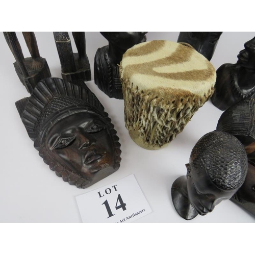 14 - Collection of African carved figures and heads. Assorted hard woods and zebra skin drum, 16cm height... 