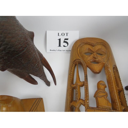 15 - African hardwood carvings, 2 pairs of elephants, and 4 face masks. Elephants 18cm height approximate... 