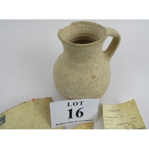 16 - Iron age jug circa 1200-930 BC, found in the Hebron area, with certificate, 17cm height. 
Condition ... 