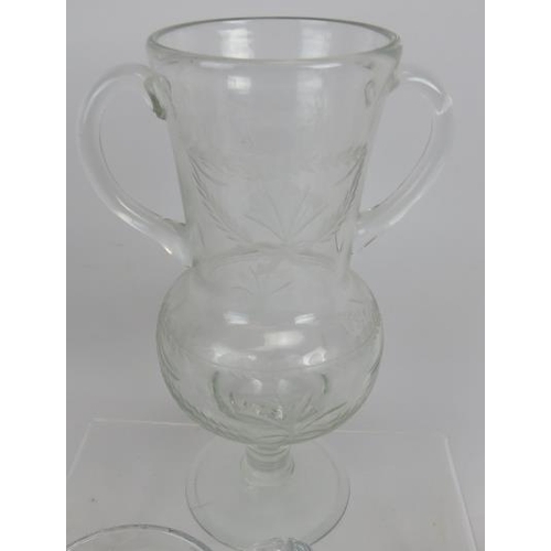 161 - Oversized wine glass, 28cm height, etched vase, flared rim vase, 2 cut glass bowls, 2 jugs. (7).
Con... 