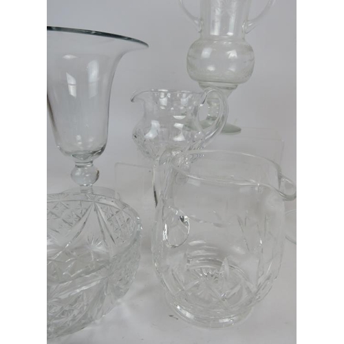 161 - Oversized wine glass, 28cm height, etched vase, flared rim vase, 2 cut glass bowls, 2 jugs. (7).
Con... 