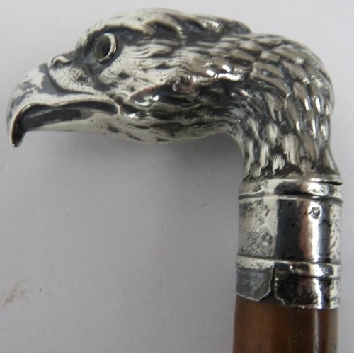 170 - A 19th century white metal mounted walking cane, probably Malacca, the handle in the form of a bird ... 