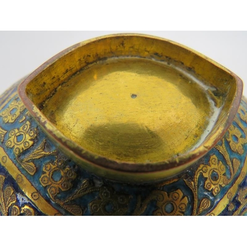 178 - A pair of Persian/Islamic gilt brass ceremonial bowls, each of elliptical/boat form with twin masks ... 