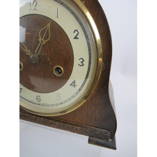 181 - Four vintage striking mantle clocks, c.1920's/30's, including an Art Deco Walnut 'cloud' shaped exam... 