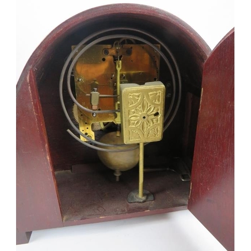 181 - Four vintage striking mantle clocks, c.1920's/30's, including an Art Deco Walnut 'cloud' shaped exam... 