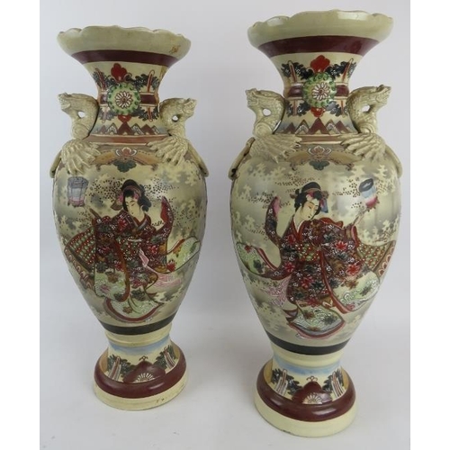 187 - A pair of large and decorative Japanese Satsuma pottery vases, c.1930's, twin dragon handles, wooden... 