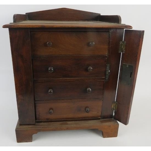 198 - A Victorian mahogany Apprentice Wellington chest, 42cm high. 
Condition report: Veneer split to one ... 