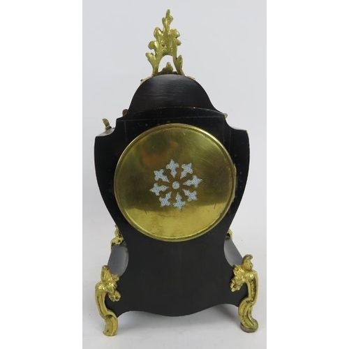 203 - A French ormolu mounted boulle inlaid and ebonised mantel clock in the Louis XVI style, early 20th c... 