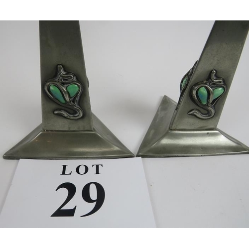 29 - Pair Arts and Crafts pewter candle sticks, 'Connell', Cheapside, 02208, 22cm height. Stamped to base... 