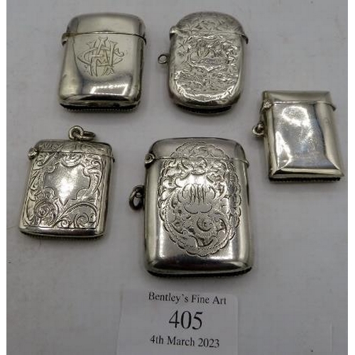 405 - A collection of five silver vesta cases. Three with foliate engraved design, one with monogram and o... 