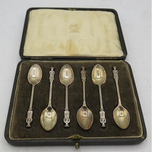 408 - A set of six silver apostle coffee spoons, London 1920. Approx weight 1.7 troy oz/52 grams, boxed.
C... 