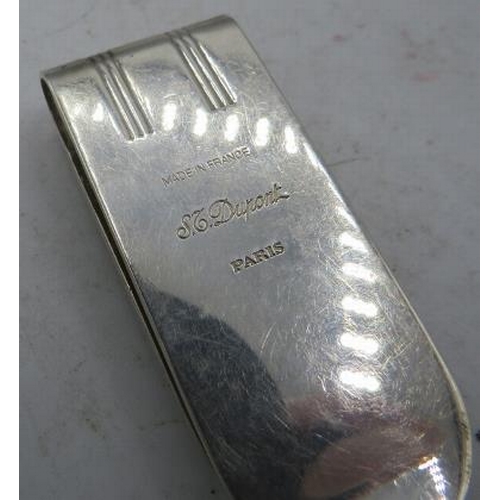 409 - A 925 stamped Dupont money clip, boxed. Approx weight 32 grams.
Condition report: Surface scratching... 