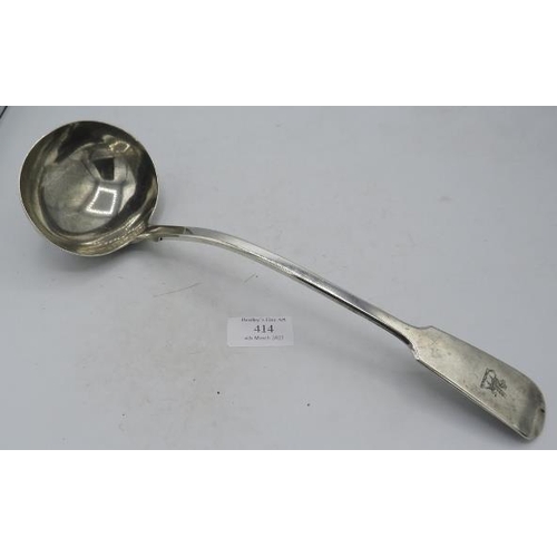 414 - A heavy Victorian silver soup ladle, London 1855 with engraved dragon crest. Approx weight 7.7 troy ... 