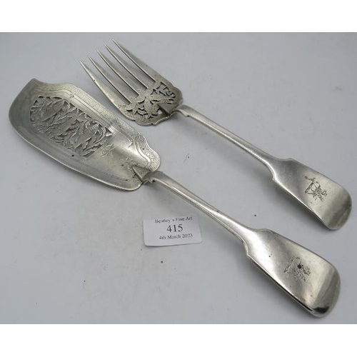 415 - A matched pair of Georgian and Victorian silver fish servers with pierced decoration of fish & folia... 