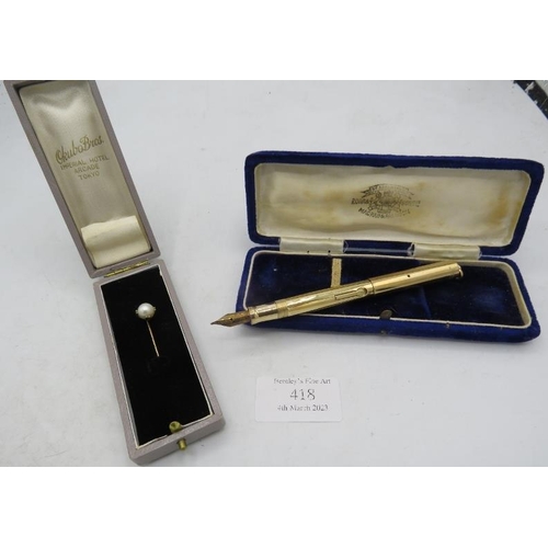 418 - A single pearl 10ct yellow gold stick pin, pearl 8mm across, boxed and a gold filled Wahl pen, boxed... 