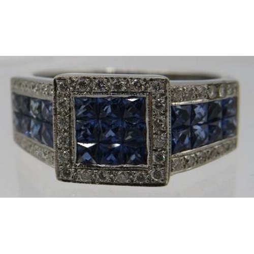 422 - An 18ct white gold calibre cut sapphires & round brilliant cut diamond ring. Sapphires approx 1.25ct... 