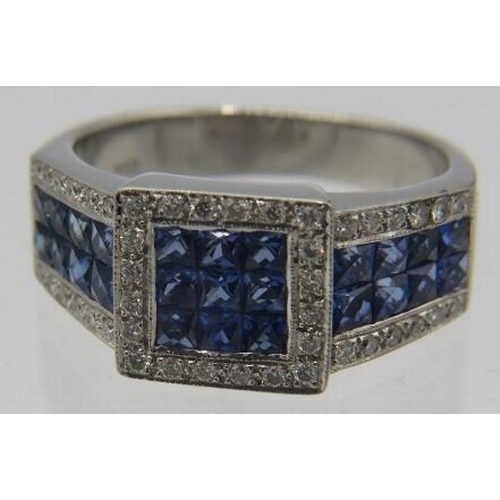 422 - An 18ct white gold calibre cut sapphires & round brilliant cut diamond ring. Sapphires approx 1.25ct... 