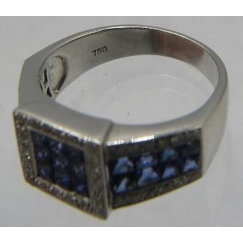 422 - An 18ct white gold calibre cut sapphires & round brilliant cut diamond ring. Sapphires approx 1.25ct... 