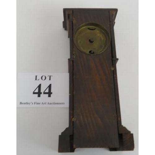 44 - Miniature long case clock, walnut, traces of gilding to etched panel, not tested, 18cm height. 
Cond... 