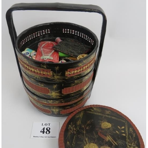 48 - Chinese sectional food containers, lacquered and gilt floral decoration, contents of sewing effects,... 