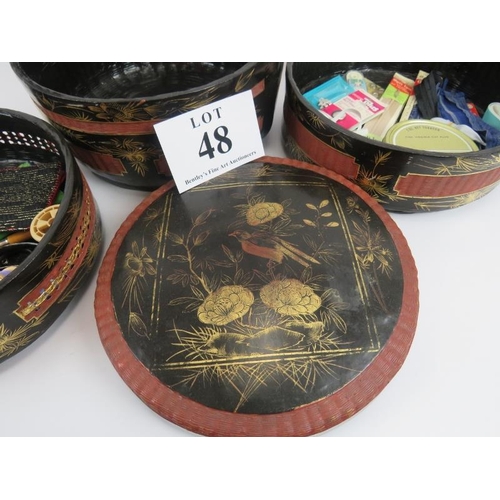 48 - Chinese sectional food containers, lacquered and gilt floral decoration, contents of sewing effects,... 