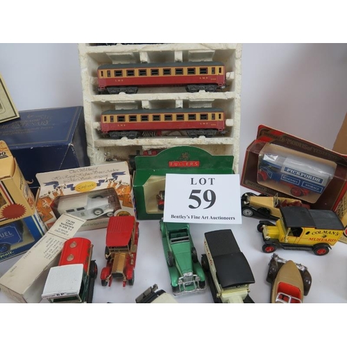 59 - Large collection of diecast and model vehicles, many in original packaging, 00 gauge train and track... 