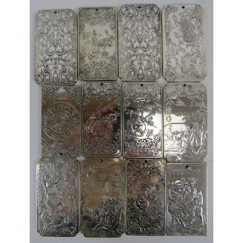 62 - A collection of 12 Chinese white metal trade tokens, 6 of which have the Chinese Zodiac signs. Marks... 