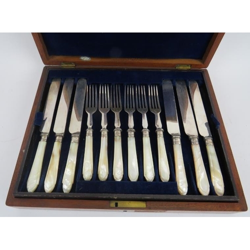 73 - A set of 12 nice quality 19th century knives and forks with mother of pearl handles, contained withi... 